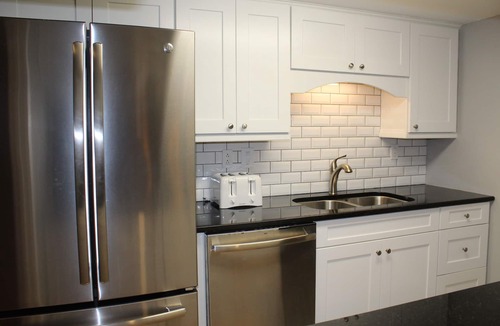 West Beach Condo | On Cougar Point - 3 minute walk to the beach - updated villa