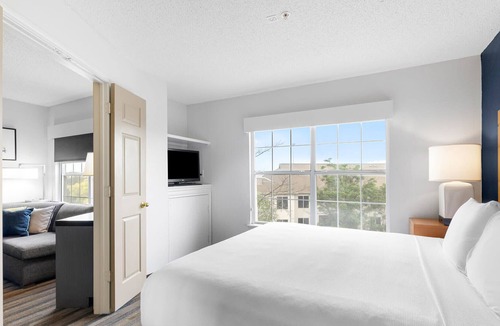 Gateway Apartment | One Bedroom King Suite - Domain Area with a Pool