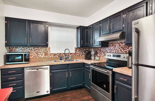 Ashley Oaks House | Open July! Hot tub! 15 min to airport~20 min to UT~4bed3bath~Game Room~Office