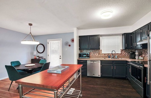 Ashley Oaks House | Open July! Hot tub! 15 min to airport~20 min to UT~4bed3bath~Game Room~Office
