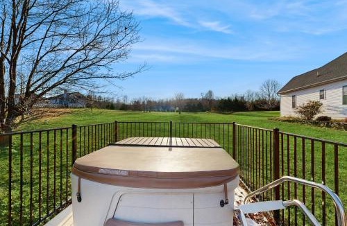 Livingston House | Peaceful lakeside retreat with hot tub, private pool, dock & paddle boards