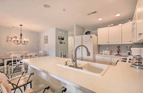 Heron Harbour Isle Condo | Pool, Canal Views! Unit 1/2 Mi to Ocean City Beach