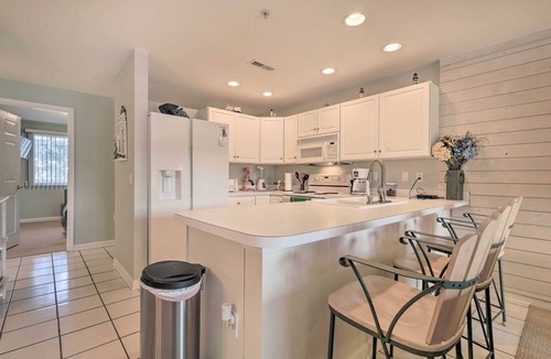 Heron Harbour Isle Condo | Pool, Canal Views! Unit 1/2 Mi to Ocean City Beach