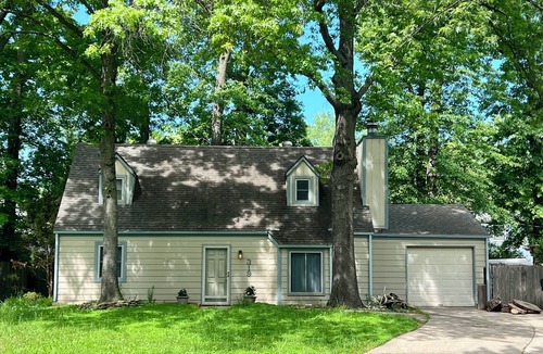 Lawrence House | Practical Zen II: 4-bdrm 2-bth 5-bed house in welcoming neighborhood.