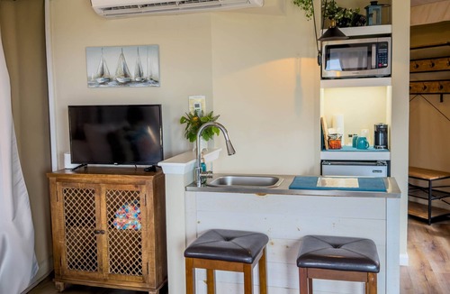Oatmeal RV Rental | Premium Suite 1 - Safari Tent - Private Deck/Hot Tub