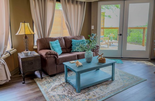 Oatmeal RV Rental | Premium Suite 1 - Safari Tent - Private Deck/Hot Tub