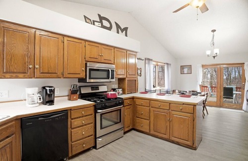 Faribault House | Private Lake Retreat with Fire Pit and Pool Table