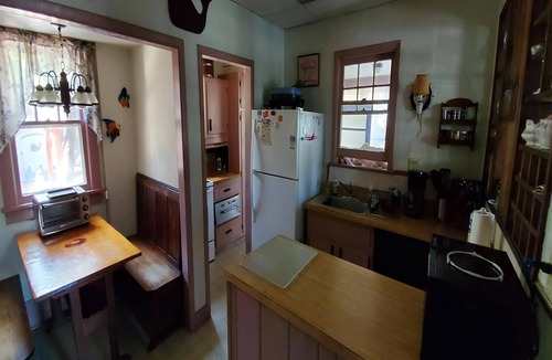 Surf City House | Quaint House Steps To The Beach with great backyard space for outside dining