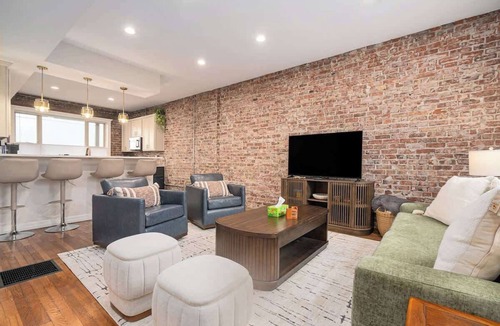 Downtown Omaha House | Rare Omaha Brownstone Retreat! 2 Kings and Garage!