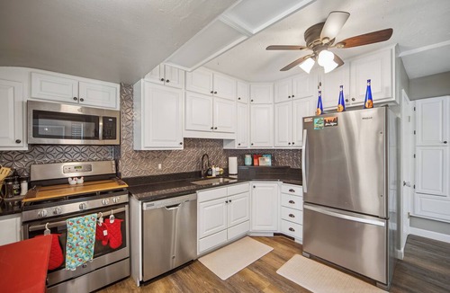 Beaverdale House | Red Door Retreat - Dog-Friendly Beaverdale Home - Fenced Yard - Sleeps 10