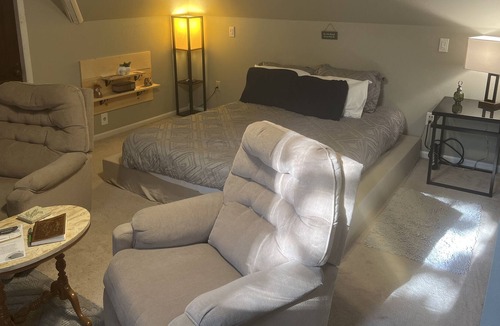 Chanute Bed & Breakfast | Relaxation Destination: A whole floor and game room to yourself