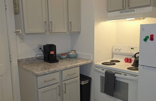 Topeka Apartment | Relaxing Downtown 1 Bed, Dog Friendly Apartment with Deck, Dog Exercise Area