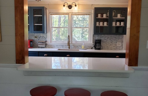 McCain Cottage | Remodeled 1840s cottage with private pool by Jordan Lake!