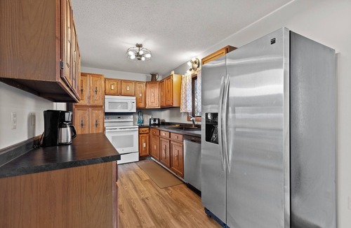 Rapid City House | Riley's Retreat Hot Tub and air conditioning!