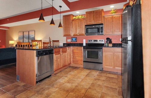 Wisconsin Dells Condo | River View Condo - Top Floor - Resort Pools - Pet Friendly!