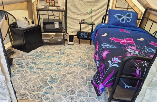 Waterloo RV Rental | Riverfront Serenity Glamping Tent in West Omaha Campground