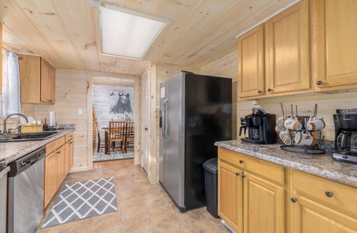 Cosby Cabin | Riverside Cabin w/Fishing, Hot Tub & Firepit