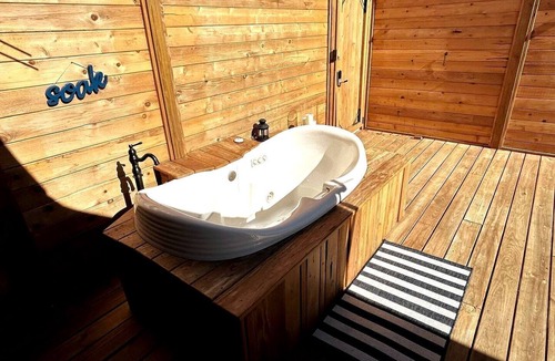 Oatmeal RV Rental | Romantic Hilltop Safari Glamping Tent with Lake Views near Lake Travis in Marble Falls, Texas