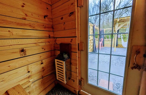 Newport House | Romantic Tiny Home in Goat Farm w King Bed Outdoor Tub Sauna
