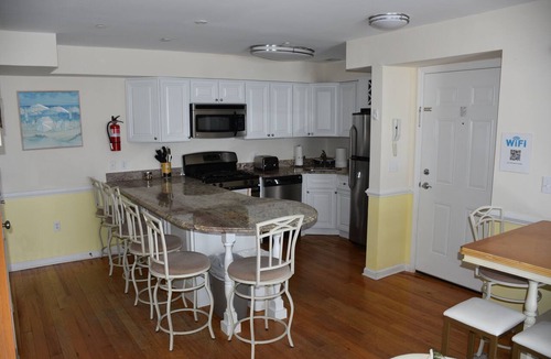 Seaside Heights Condo | Roof top pool & game room, 2 blocks to beach, 3/bedrooms, beach passes included