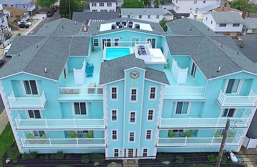 Seaside Heights Condo | Roof top pool & game room, 2 blocks to beach, 3/bedrooms, beach passes included