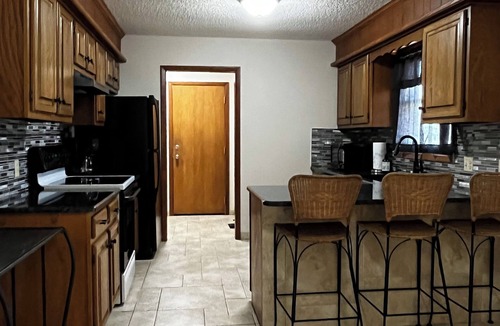 Wichita House | Rural setting on poultry farm with large home and outdoor space!
