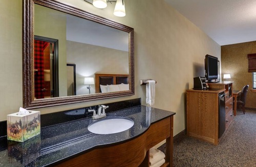 Sioux City Hotel | Rustic Charm Meets Modern Comfort: Cozy Lodge in Downtown Sioux City