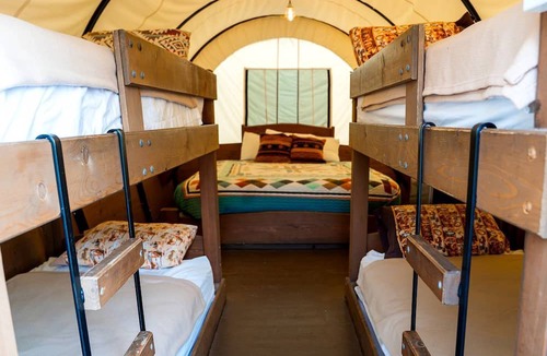 South Oklahoma City House | Rustic Conestoga Glamping Covered Wagon for Amazing Getaways to Oklahoma Farm