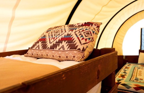 South Oklahoma City House | Rustic Conestoga Glamping Covered Wagon for Amazing Getaways to Oklahoma Farm