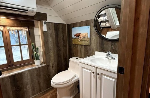 Pinnacles Entrance Badlands House | Rustic Covered Glamping Wagons with Modern Comforts Near Wall Drug – Wall, South Dakota