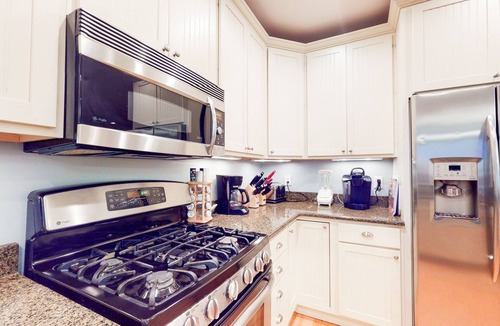 Fenwick Island House | Salt Meadows bayfront townhome w/elevator, gas grill & shared pool/pier