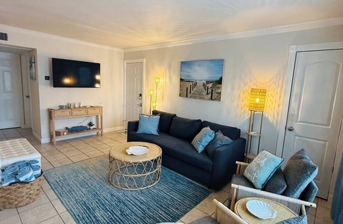 Northeast Virginia Beach Condo | Sandy Toes & Salty Air: 2BR Modern Condo Steps from the Surf