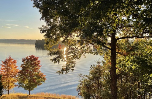 Ten Mile House | Scenic lake house with private covered dual-slip and two covered lake-view decks