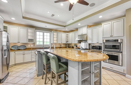 Sunrise Bay House | Secluded lakefront home with elevator, dock, private saltwater pool & hot tub