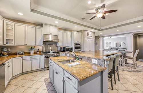 Sunrise Bay House | Secluded lakefront home with elevator, dock, private saltwater pool & hot tub