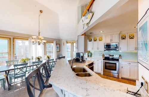 Ocean Sands House | Semi Oceanfront 5 bedroom dog friendly cottage 10 feet to beach access