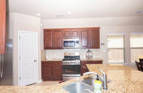 Pflugerville House | Serene Austin Escape a minute walk to the communal pool and gym