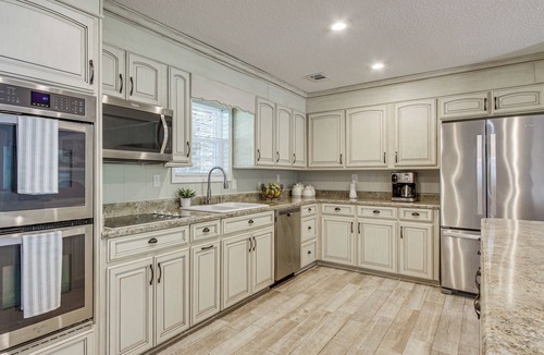 Florence House | Shoals Area Oasis w/Boat Dock & Outdoor Kitchen
