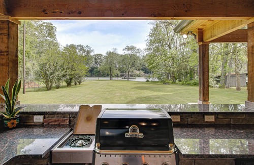 Florence House | Shoals Area Oasis w/Boat Dock & Outdoor Kitchen