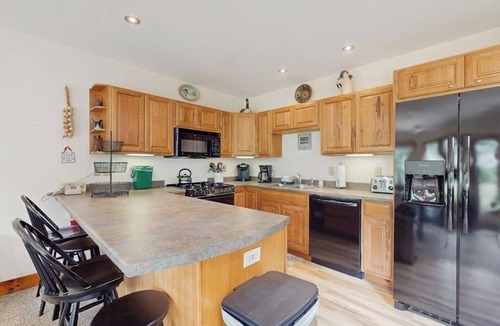 North Troy House | Ski-in/ski-out townhome with great views & deluxe resort amenities