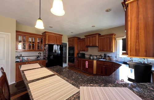 Olathe House | Spacious 5-bedroom house in Olathe. Finished basement and outdoor deck/space.