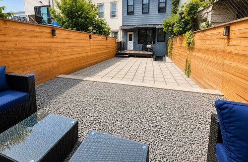 Cypress Hills House | Spacious Brooklyn Townhouse Theater Backyard Sleeps 16+