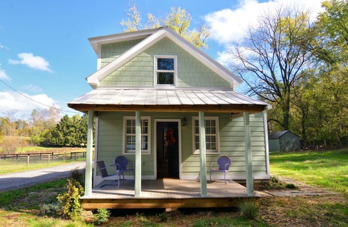 Tuscarora Cottage | Springs Store Cottage Entire Property king bed