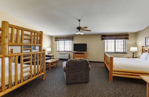 St. Joseph Hotel | St. Joseph's Heritage Haven with Themed Rooms & Hot Tub