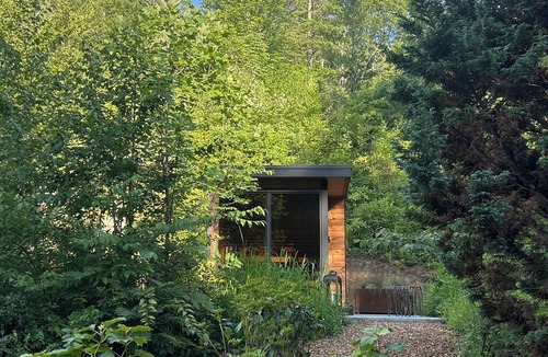 Newland Cabin | Storybook Forest Cottage with Loft Bedroom & Wellness Courtyard Access
