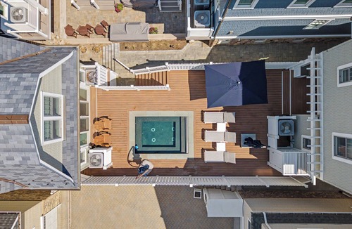 Manasquan House | Stunning Manasquan getaway featuring a private pool and hot tub where comfort meets coastal luxury.