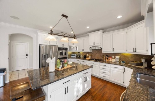 Overland Park House | Stunning private villa pond, theater