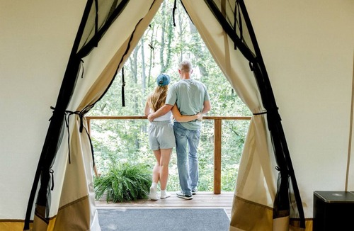 Saylorville RV Rental | Stunning Tented Cabin with Fire Pit in Des Moines, Iowa