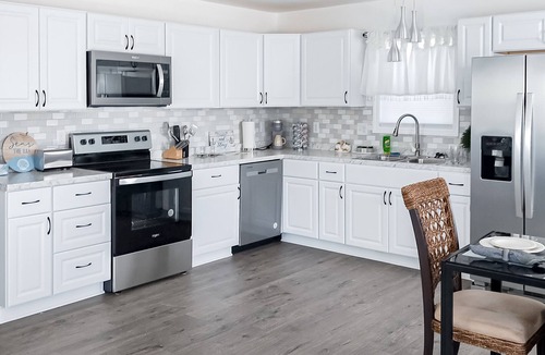 Charlotte House | Stylish & private guesthouse with sunny patio, central AC, & W/D - with pool