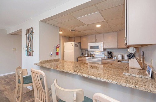 North Ocean City Condo | Stylish, spacious 2 bedroom condo with free WiFi, an indoor pool, and HBO channels located uptown near mini golf and movie theater and only a block to the beach!